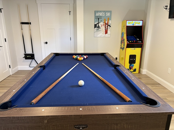 Game room with pool table, darts and Pac-Man arcade